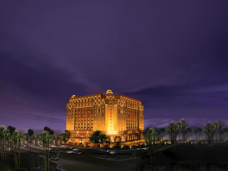 The Leela Palace New Delhi exterior view showcasing the grand palace architecture and manicured grounds